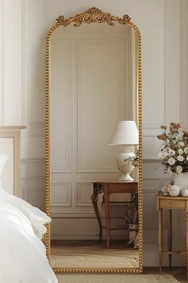 Antique Gold Baroque Arched Floor Mirror with Ornate Crown Carving and Beaded Frame Detail.