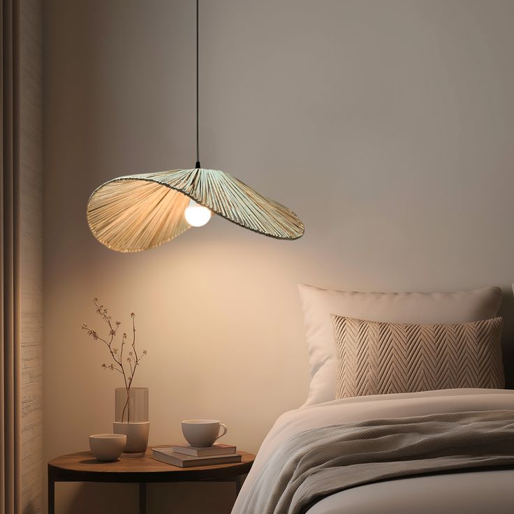 Bent Artisanal Raffia Pendant Light in Natural Fiber with Antique Brass Accents.